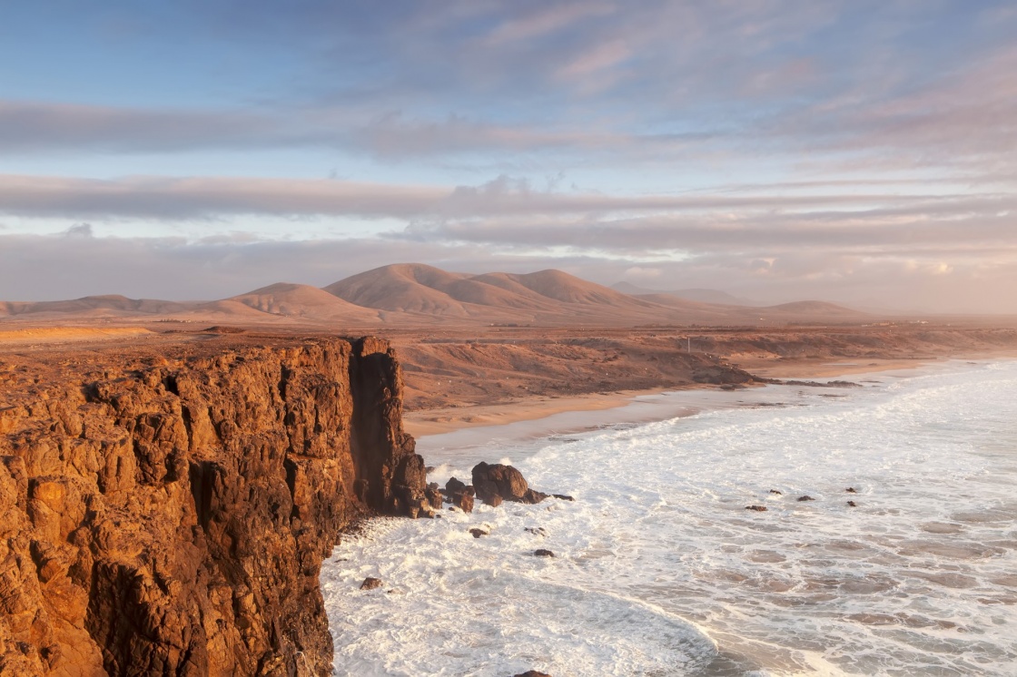 sand-between-your-toes-fuerteventura-beaches-el-cotillo-beach-in-fuerteventura-island-on-sunset-663-5a28